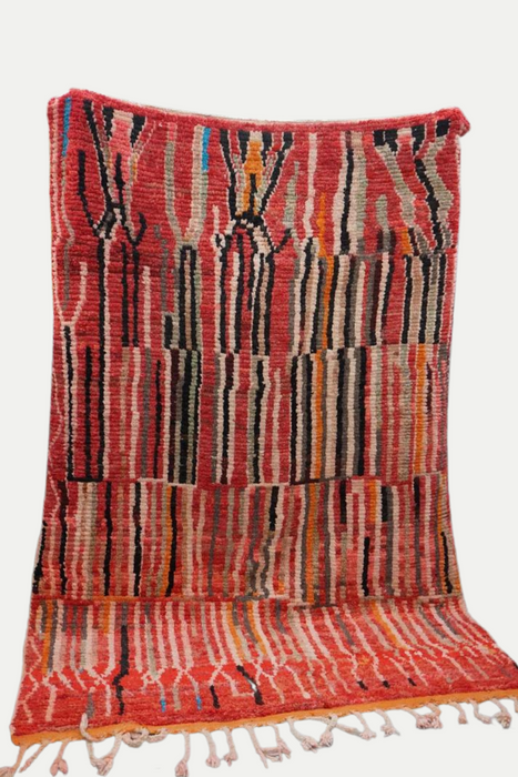 Colorful stripped Moroccan rug